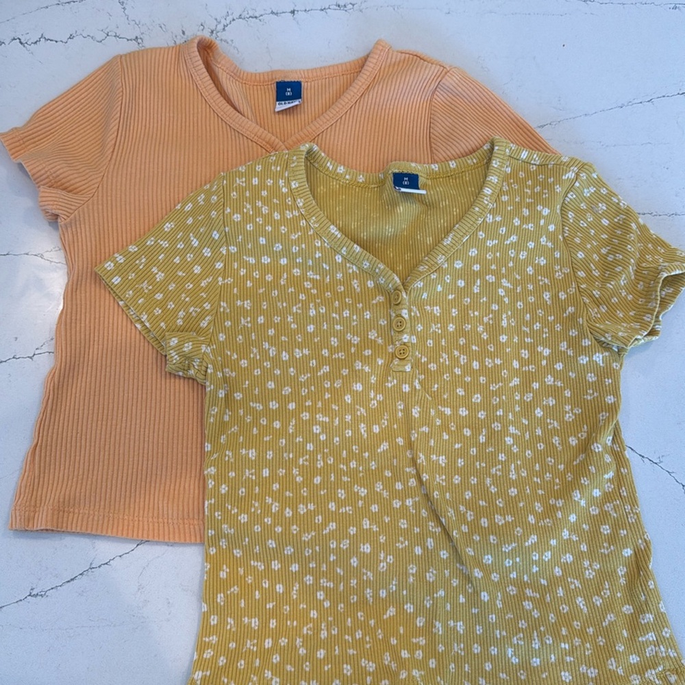 2 Old Navy tshirts.  Orange and mustard w white flowers.  Like new.  8.